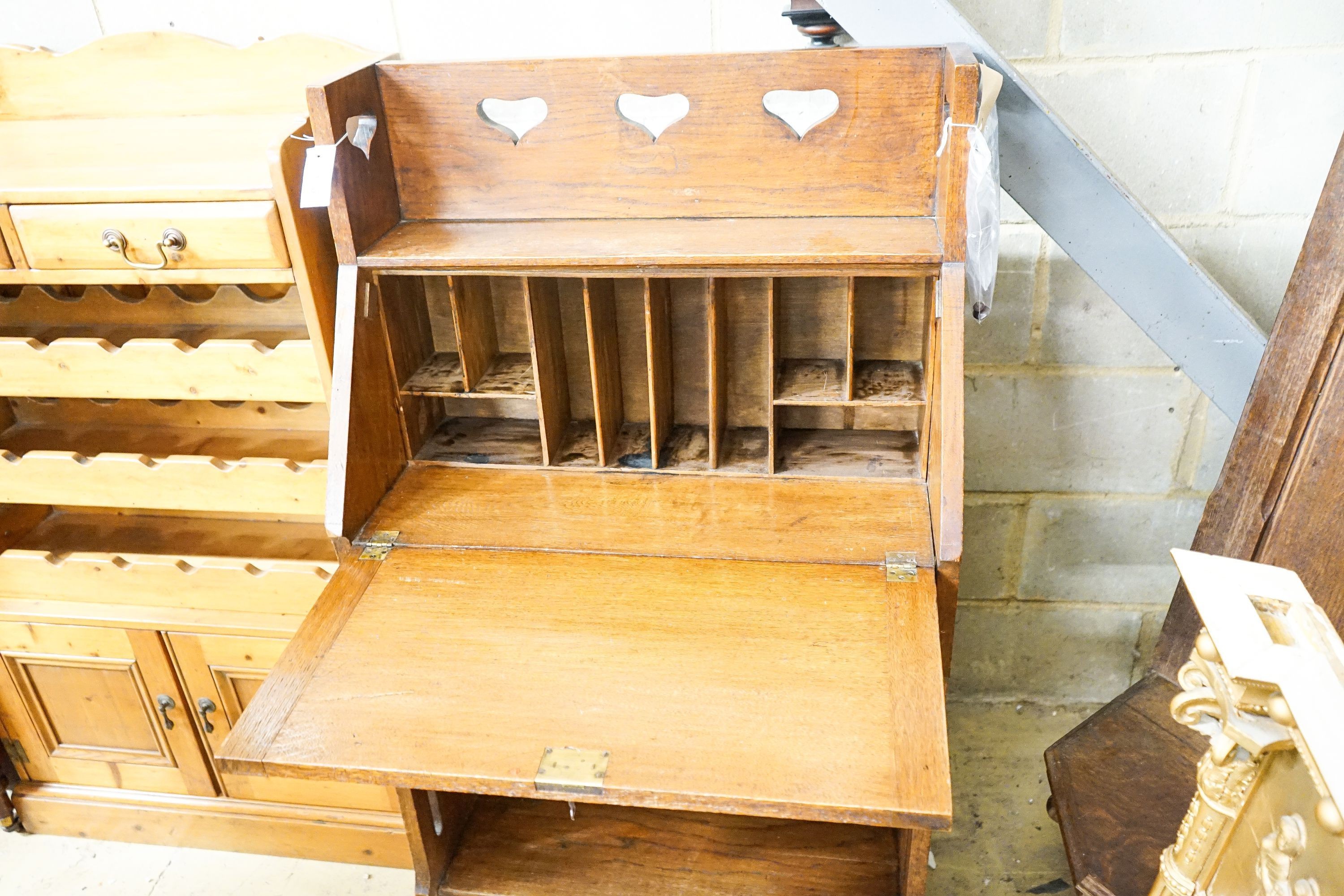 A late Victorian Art Nouveau oak bureau, width 71cm, depth 33cm, height 120cm